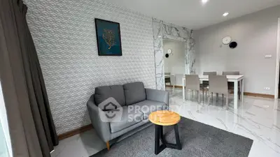 Modern living room with stylish decor and dining area