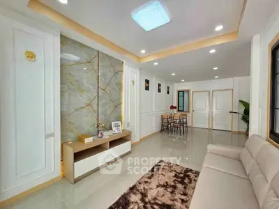 Spacious modern living room with elegant decor and ample natural light