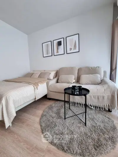 Cozy bedroom with stylish decor and comfortable seating area