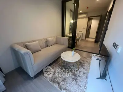 Modern living room with plush sofa and stylish decor in a cozy apartment