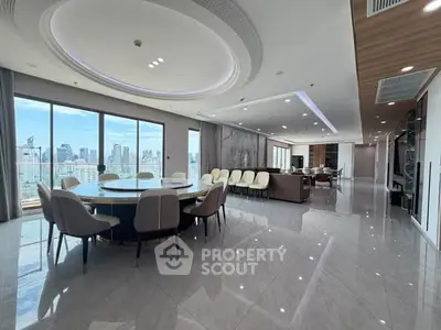 Luxurious open-plan living room with panoramic city views and elegant dining area.