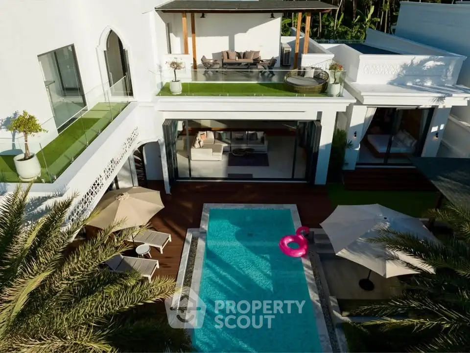 Luxurious villa with private pool, spacious balcony, and elegant modern design, perfect for upscale living.