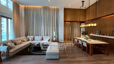 Luxurious modern living room with elegant dining area and high ceilings