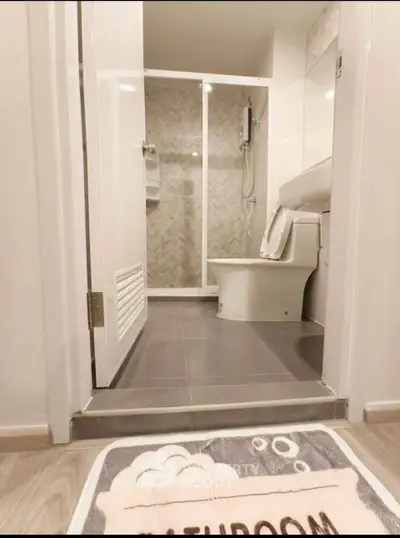 Modern bathroom with sleek design and shower area