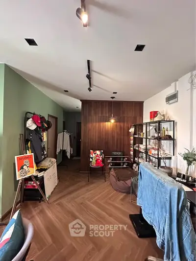 Chic and modern living room with stylish decor and wooden flooring