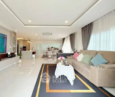 Spacious modern living room with elegant decor and open layout