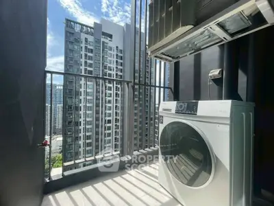 Modern high-rise balcony with washing machine and stunning city view