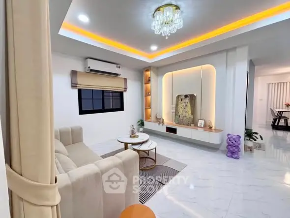 Luxurious modern living room with elegant lighting and stylish decor