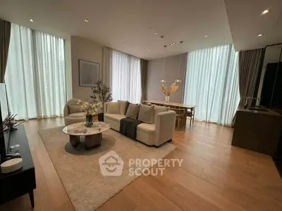 Spacious modern living room with elegant decor and natural light