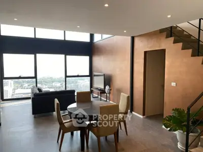 Luxurious high-rise living room with stunning city view and modern decor