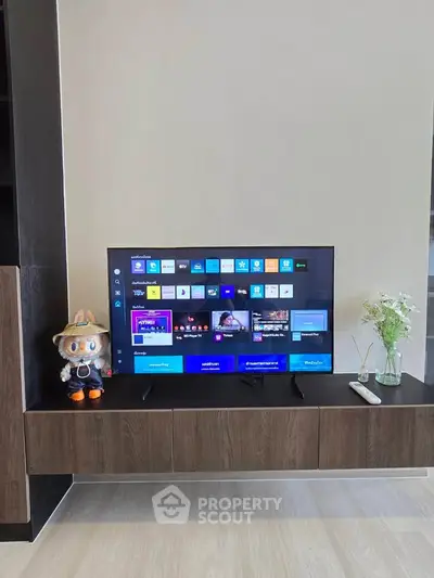 Modern living room with sleek TV setup and stylish decor