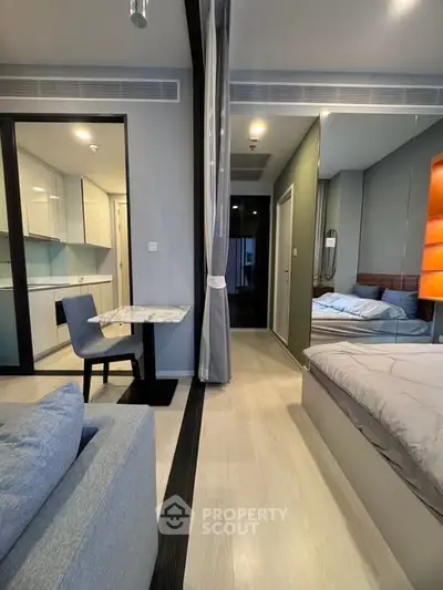 Modern studio apartment with open layout and stylish furnishings