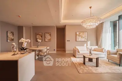 Luxurious living room with elegant chandelier and modern decor in upscale apartment