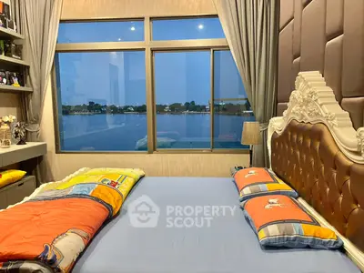 Luxurious bedroom with stunning river view and elegant decor