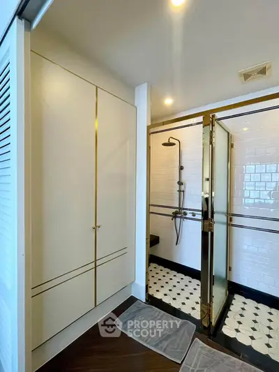 Luxurious bathroom with elegant shower and stylish cabinetry