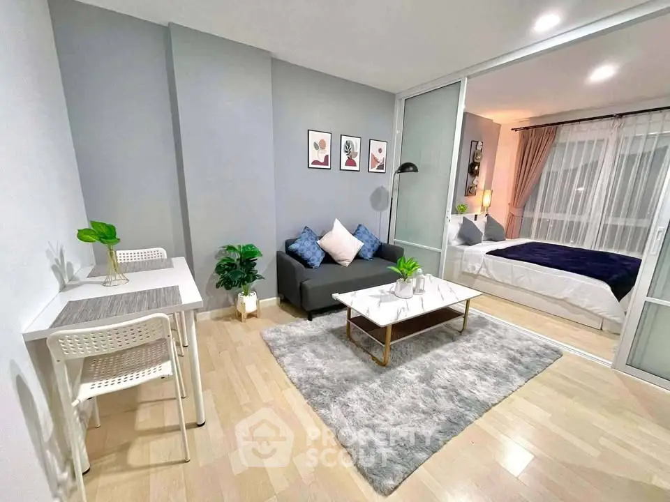 Modern studio apartment with stylish decor and cozy living area