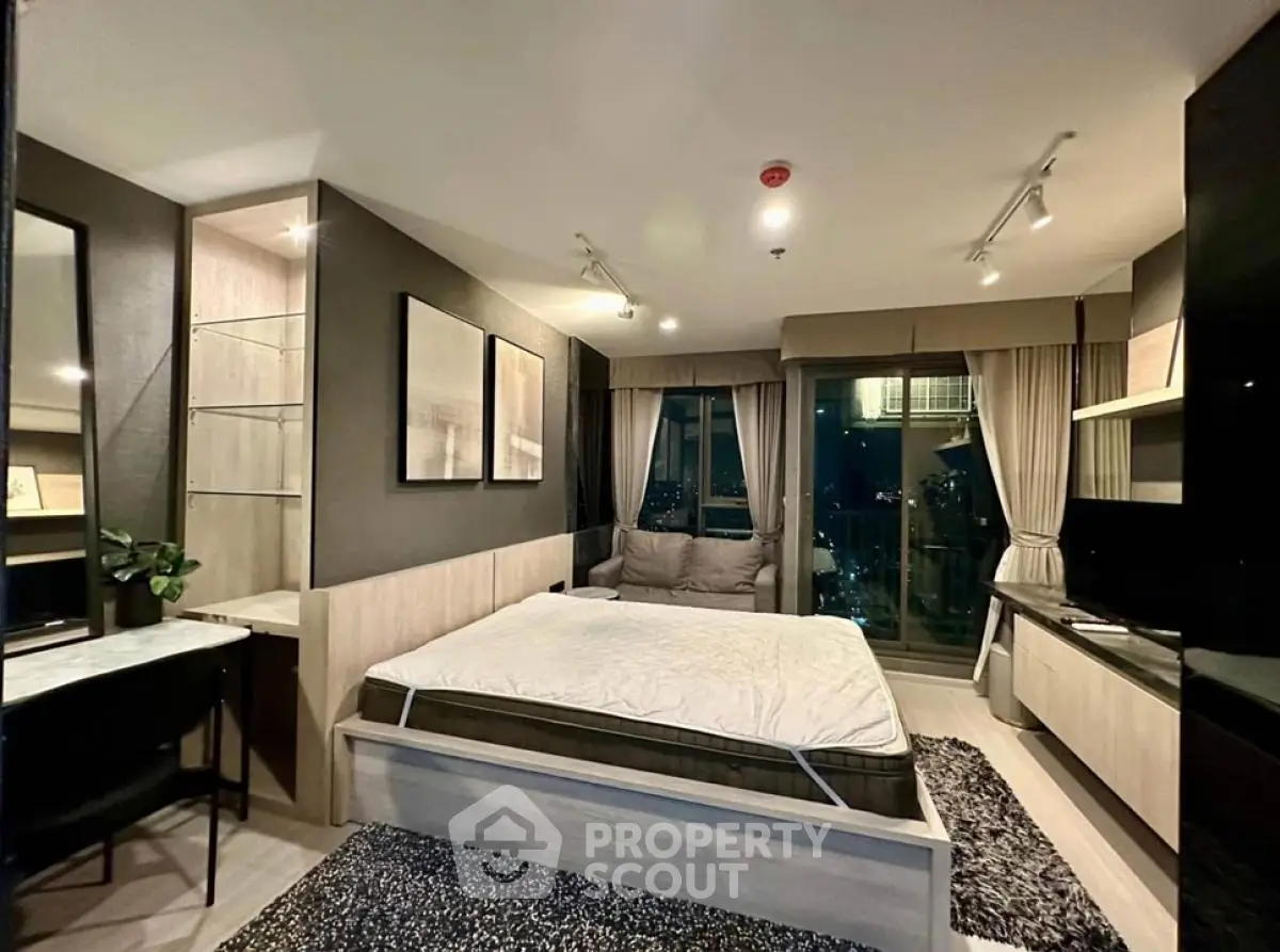 Luxurious modern bedroom with city view and stylish decor