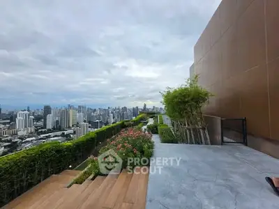 Stunning rooftop garden with panoramic city views, perfect for relaxation and entertainment.