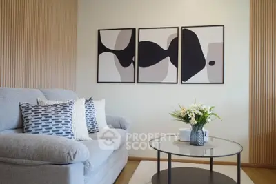Stylish living room with modern art and cozy seating area