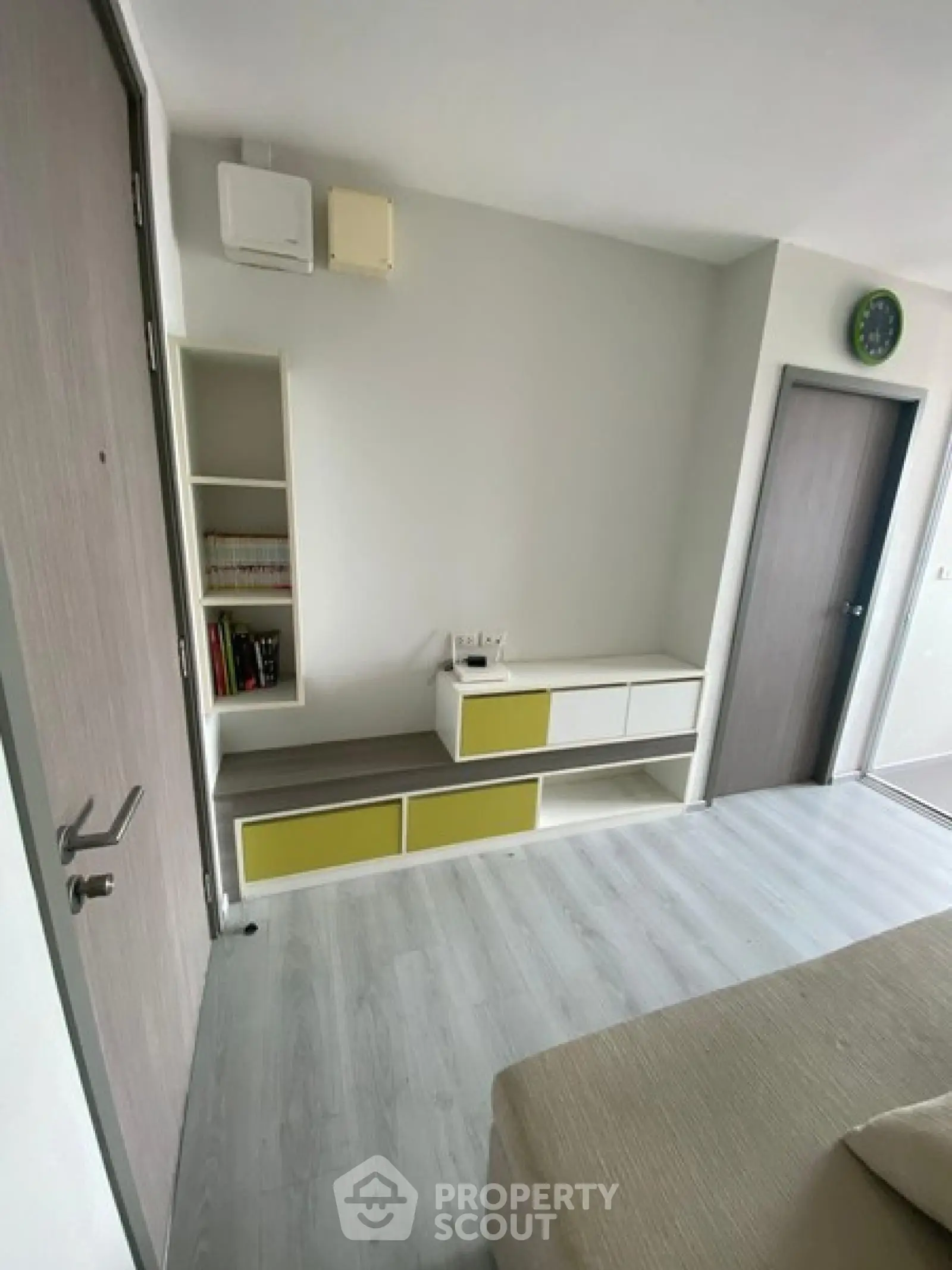 Modern living room with sleek storage and minimalist design