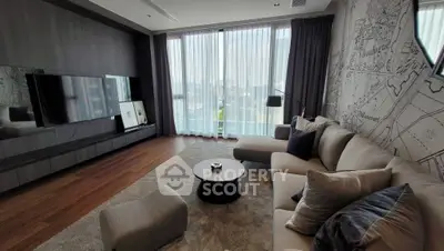 Modern living room with large windows and stylish decor