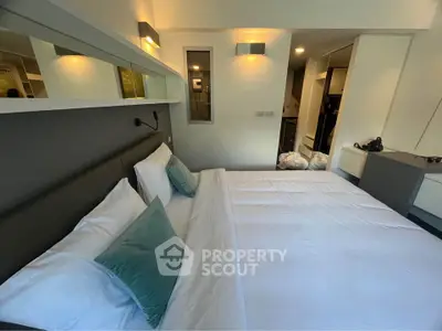 Modern bedroom with stylish decor and cozy ambiance