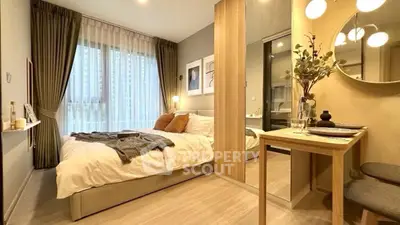 Modern bedroom with cozy decor and natural light in urban apartment