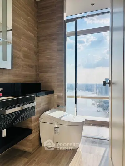 Luxurious bathroom with stunning city view and modern fixtures