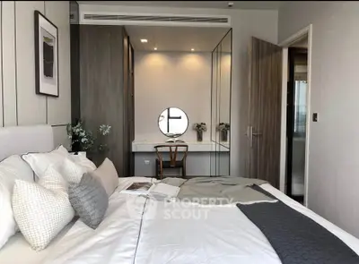 Luxurious bedroom with modern decor and cozy ambiance, featuring elegant furnishings and stylish design.