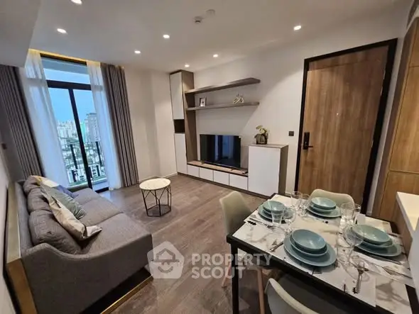 Modern living room with stylish decor and dining area, featuring city view from large window.