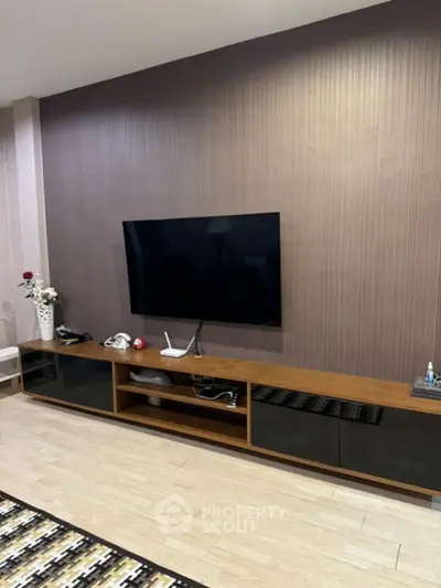Modern living room with sleek TV unit and stylish decor