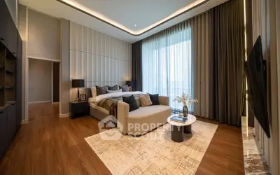 Luxurious bedroom with modern decor, large windows, and elegant furnishings in a high-end apartment.