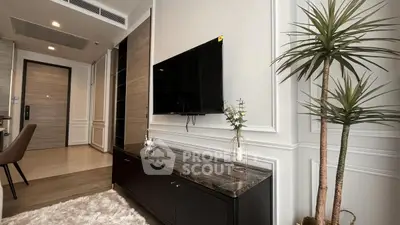 Modern living room with sleek TV setup and stylish decor