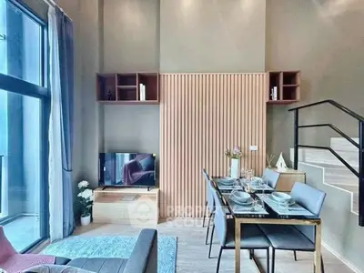 Modern living room with dining area and stylish decor