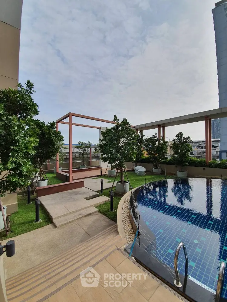 Luxurious rooftop pool with stunning city views and lush greenery