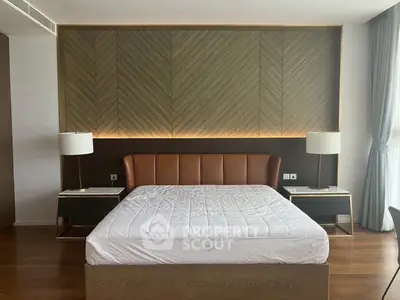 Luxurious bedroom with elegant wood paneling and modern furnishings