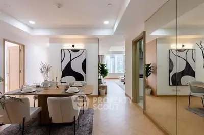 Modern dining area with elegant decor and city view in luxury apartment.