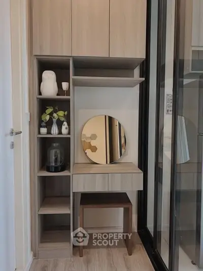 Modern compact study nook with wooden shelves and decorative items, perfect for small spaces.
