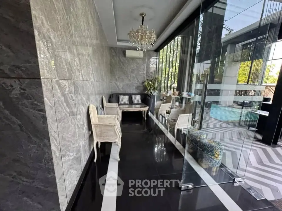 Luxurious modern living area with elegant decor and glass walls