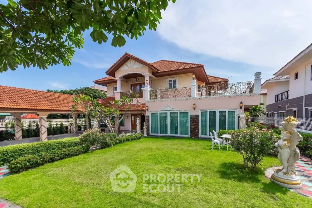 Luxurious villa with lush garden and elegant balcony in prime location
