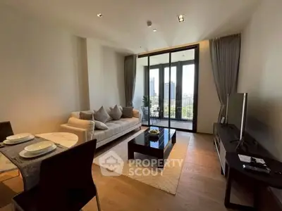 Modern living room with balcony view and elegant decor