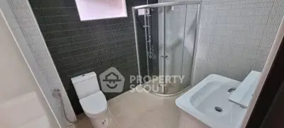 Modern bathroom with sleek shower and stylish tiles