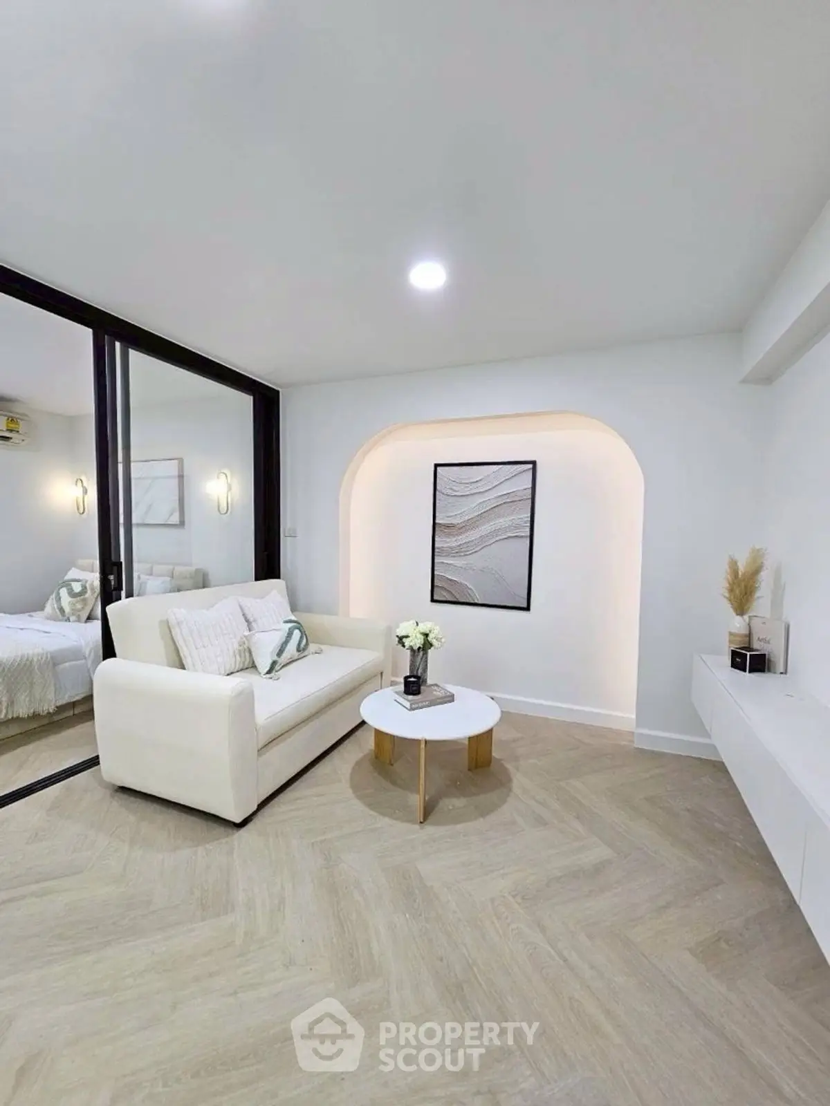 Modern living room with elegant decor and cozy seating area