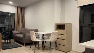 Modern living room with cozy sofa and dining area in stylish apartment.