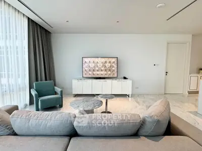 Spacious modern living room with elegant decor and natural light