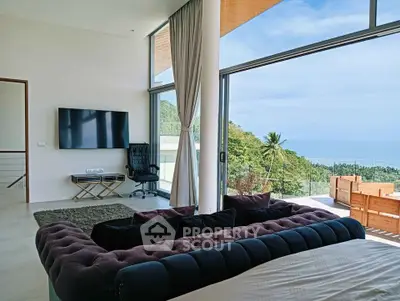 Luxurious living room with stunning ocean view and modern decor