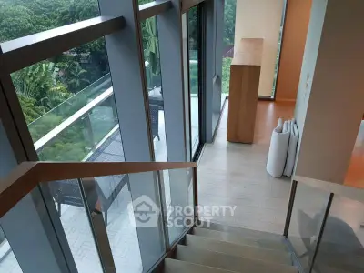Luxurious modern home with stunning balcony view and sleek interior design.