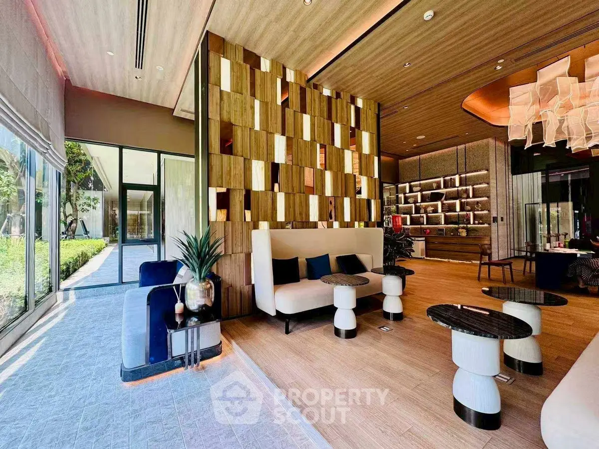 Luxurious modern living room with stylish decor and garden view