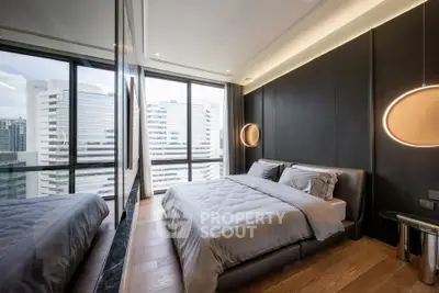 Luxurious modern bedroom with city view and elegant lighting