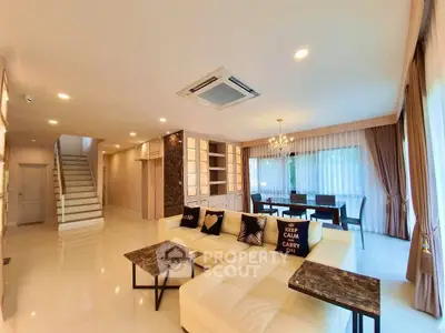 Spacious modern living room with elegant decor and natural light